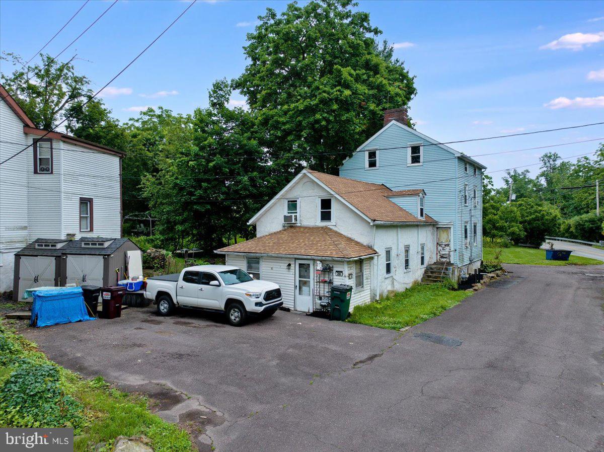 3854-3856 Schuylkill Road Spring City, PA 19475 - Photo 11 of 22 a cars parked in front of a house