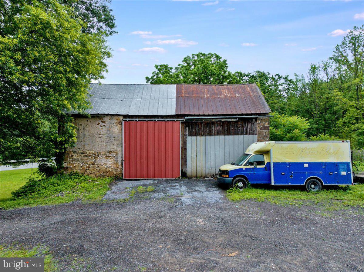 3854-3856 Schuylkill Road Spring City, PA 19475 - Photo 14 of 22 a front view of a house with yard and garage