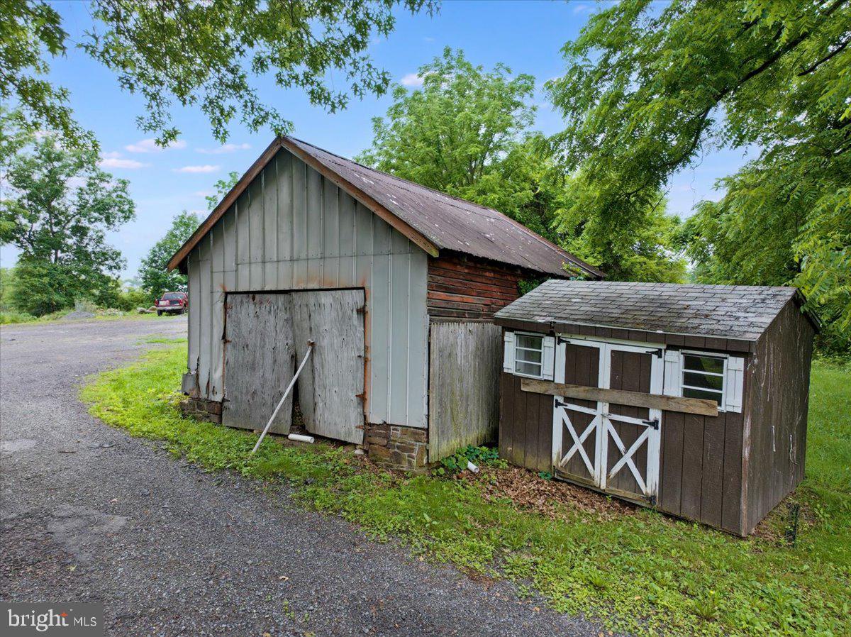 3854-3856 Schuylkill Road Spring City, PA 19475 - Photo 15 of 22 a view of a house with a yard plants and large tree