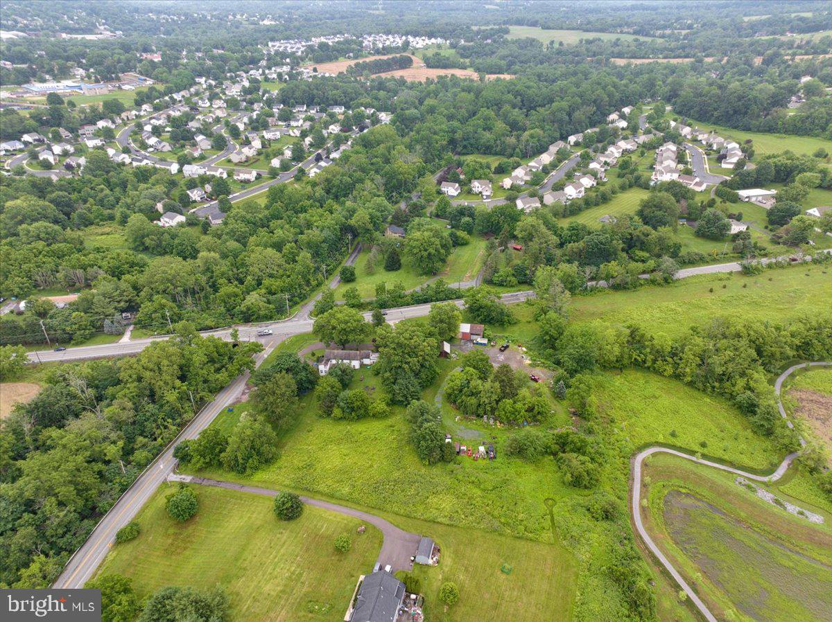 3854-3856 Schuylkill Road Spring City, PA 19475 - Photo 20 of 22 an aerial view of residential houses with outdoor space and trees