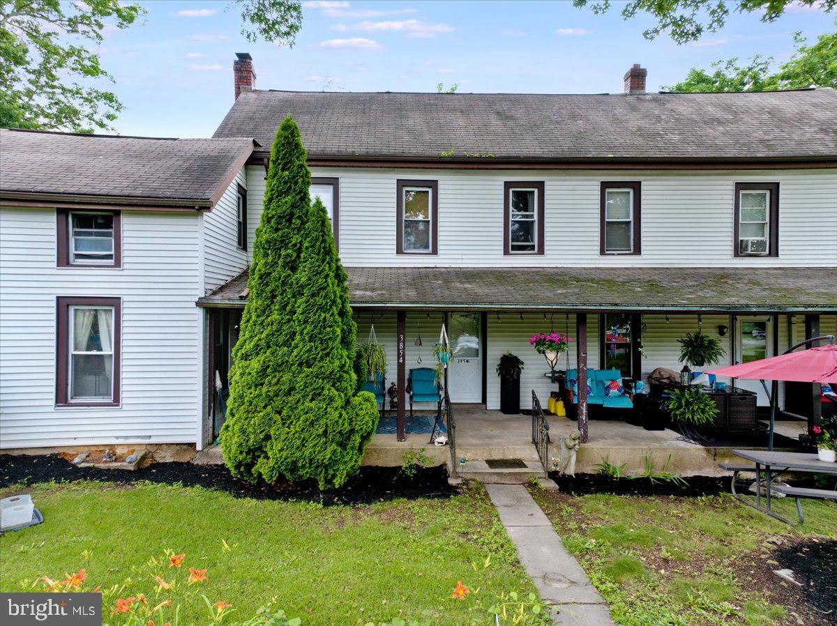 3854-3856 Schuylkill Road Spring City, PA 19475 - Photo 3 of 22 a front view of a house with a yard
