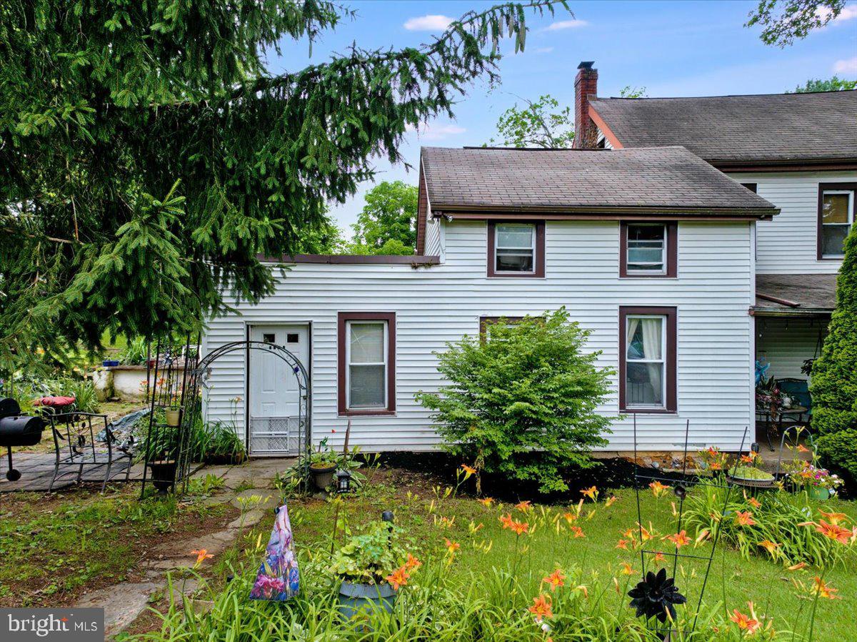 3854-3856 Schuylkill Road Spring City, PA 19475 - Photo 6 of 22 a front view of a house with a yard