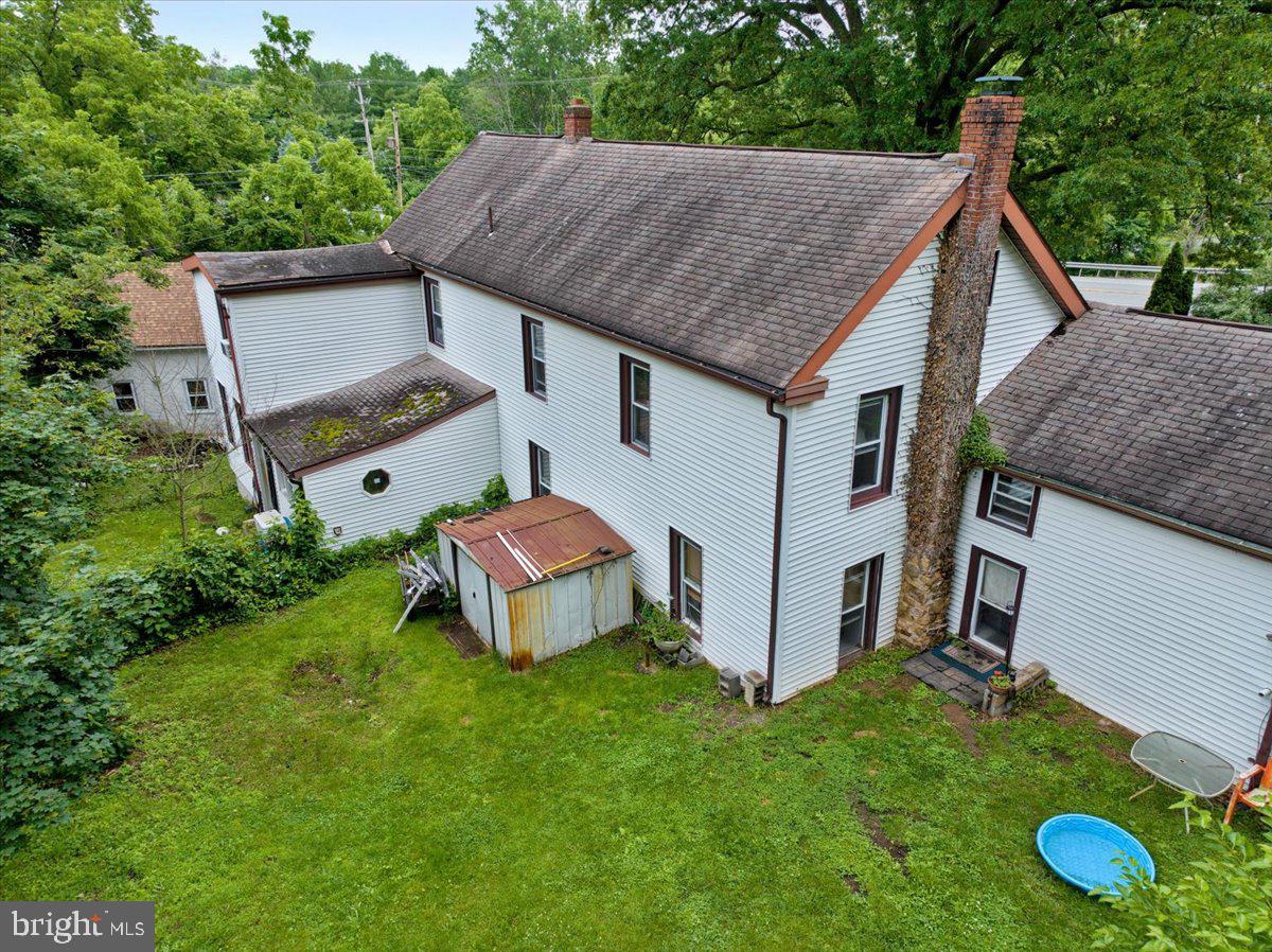 3854-3856 Schuylkill Road Spring City, PA 19475 - Photo 9 of 22 a aerial view of a house with backyard space and garden