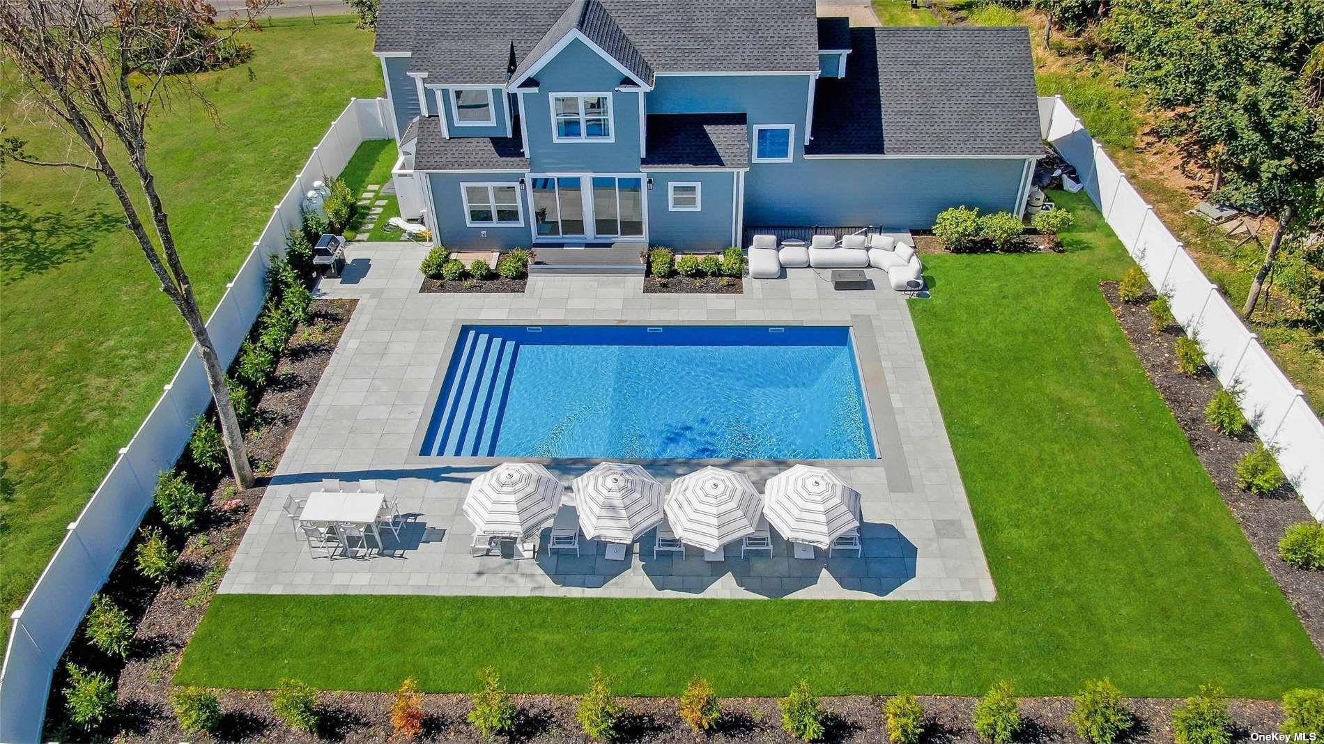 950 Tasker Lane Greenport, NY 11944 - Photo 18 of 37 an aerial view of a house with garden space and street view