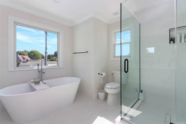 a bathroom with a sink and a large mirror