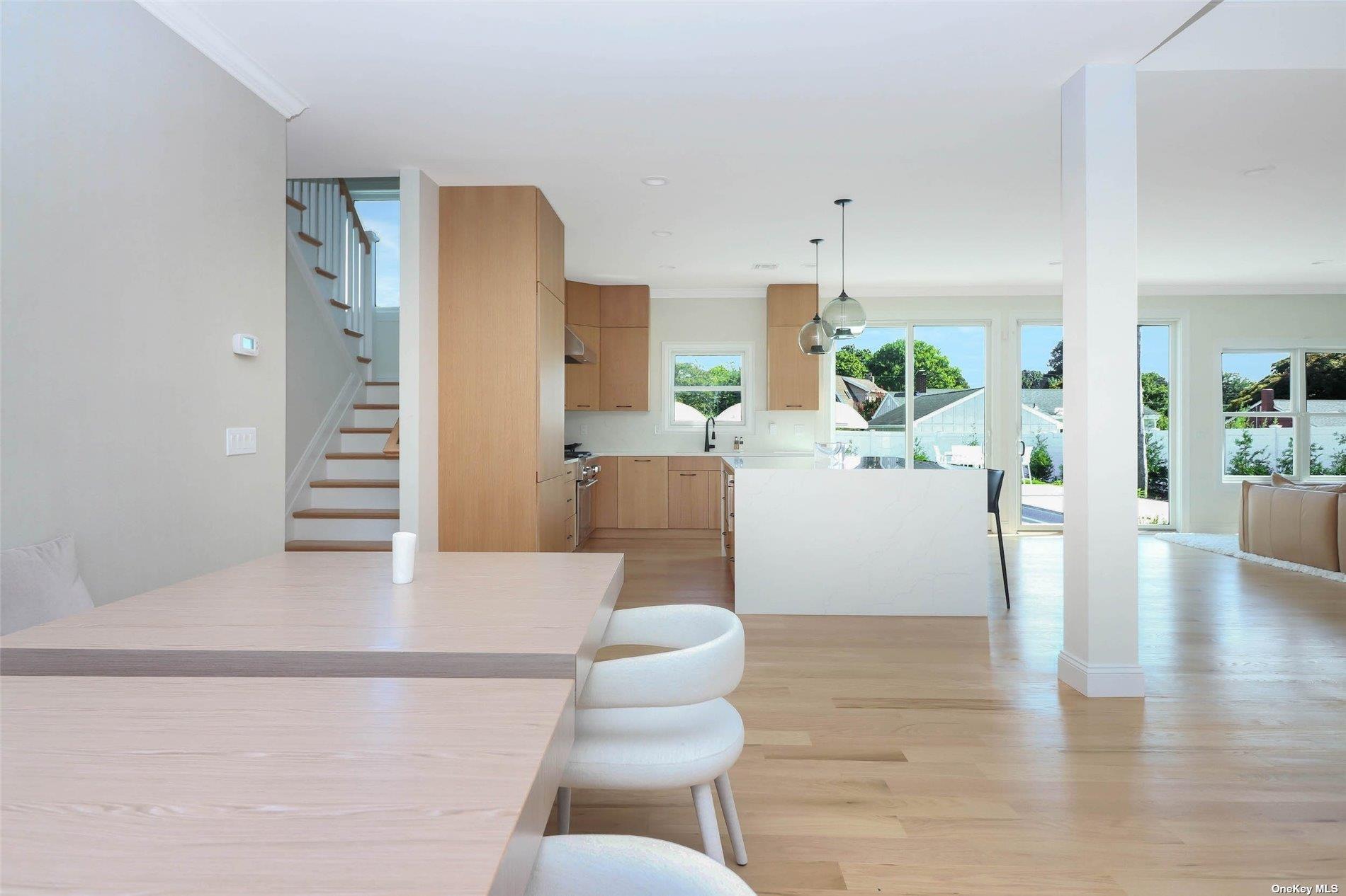 950 Tasker Lane Greenport, NY 11944 - Photo 10 of 37 a living room with furniture and a large window