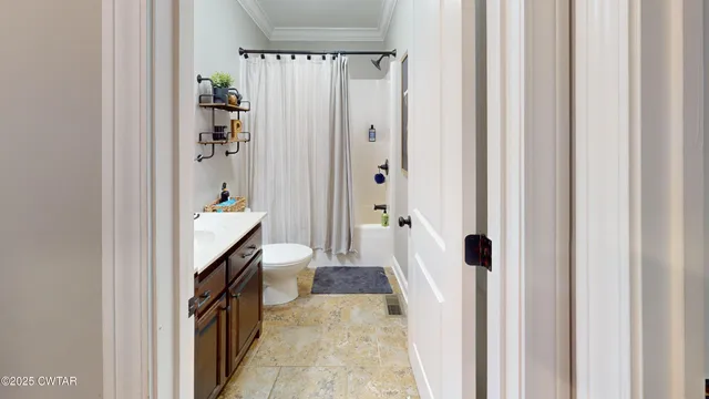 a view of hallway with wooden floor