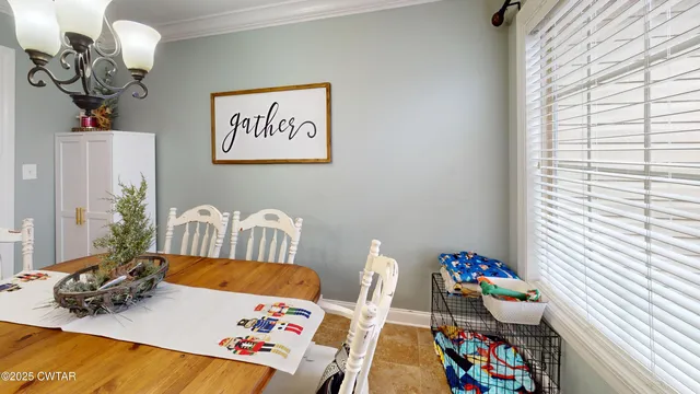 a bedroom with furniture and a wooden floor
