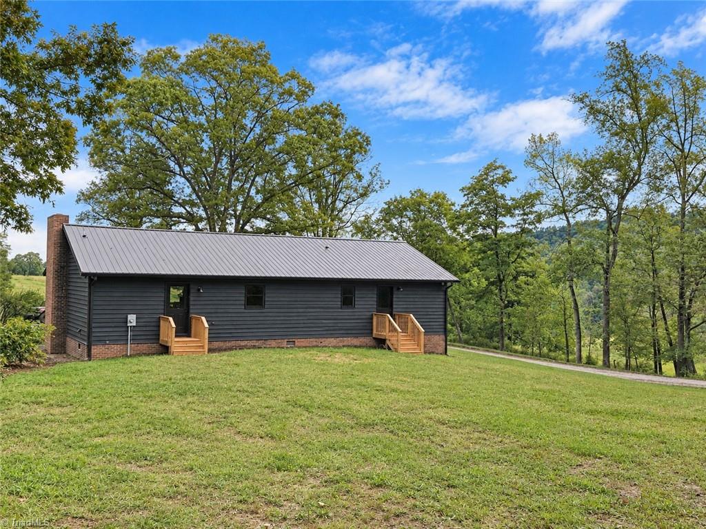 526 Hoover Mountain Road Purlear, NC 28665 - Photo 20 of 26 Backyard