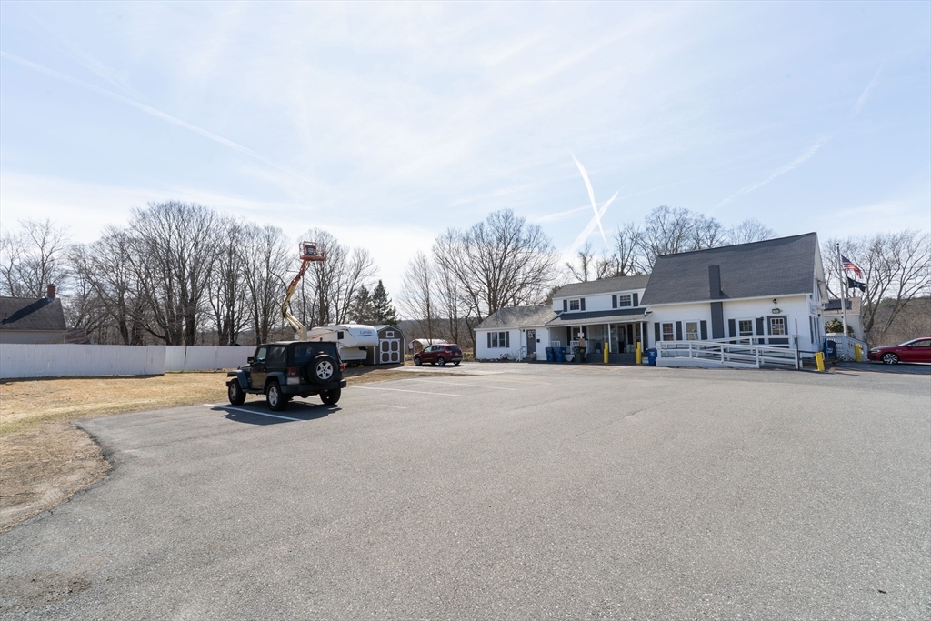 2 Monson Road Wales, MA 01081 - Photo 8 of 23 a view of a city street with a building and trees