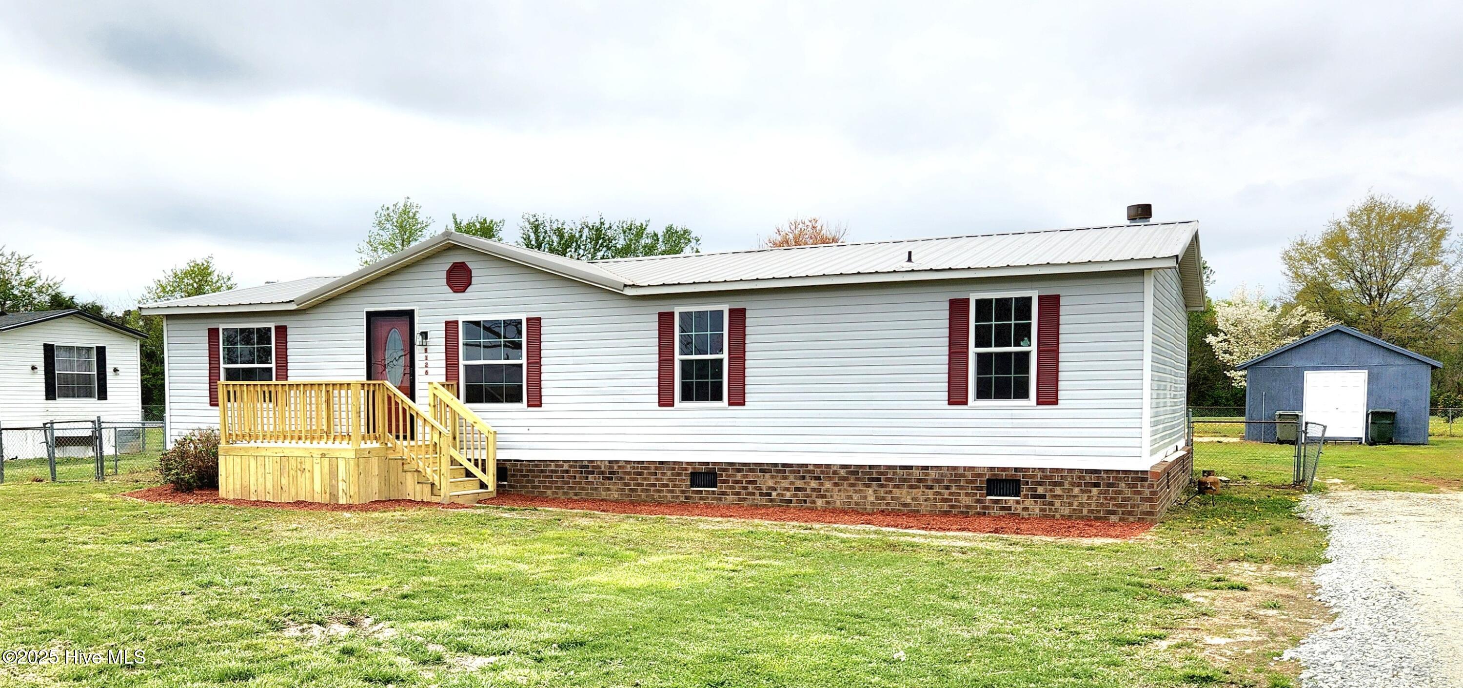 8126 Tedder Road Lucama, NC 27851 - Photo 2 of 31 20250402_122722