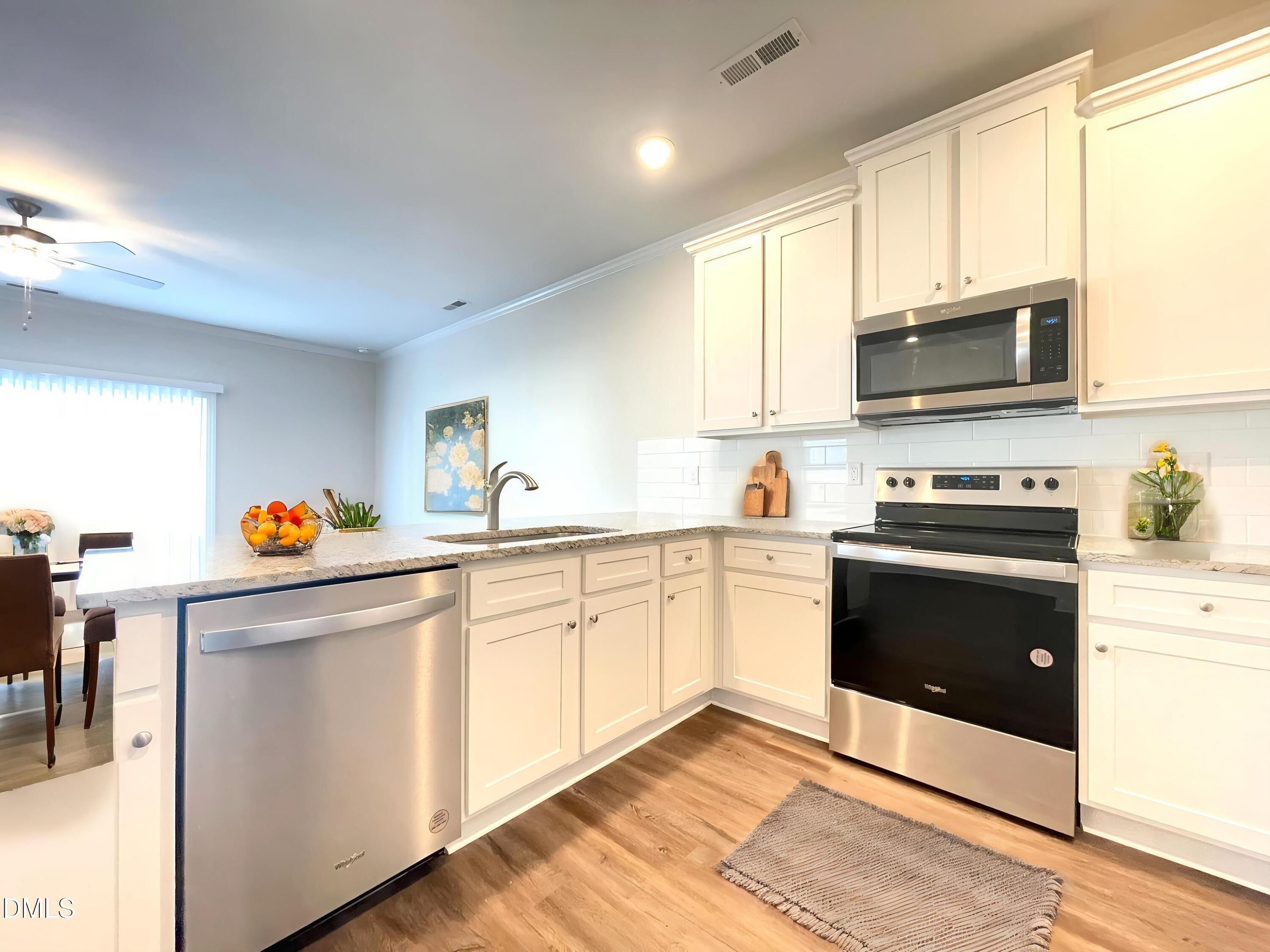6911 Outfall Point Lane Raleigh, NC 27616 - Photo 6 of 34 IMG_2525 - Kitchen - Modern - 2
