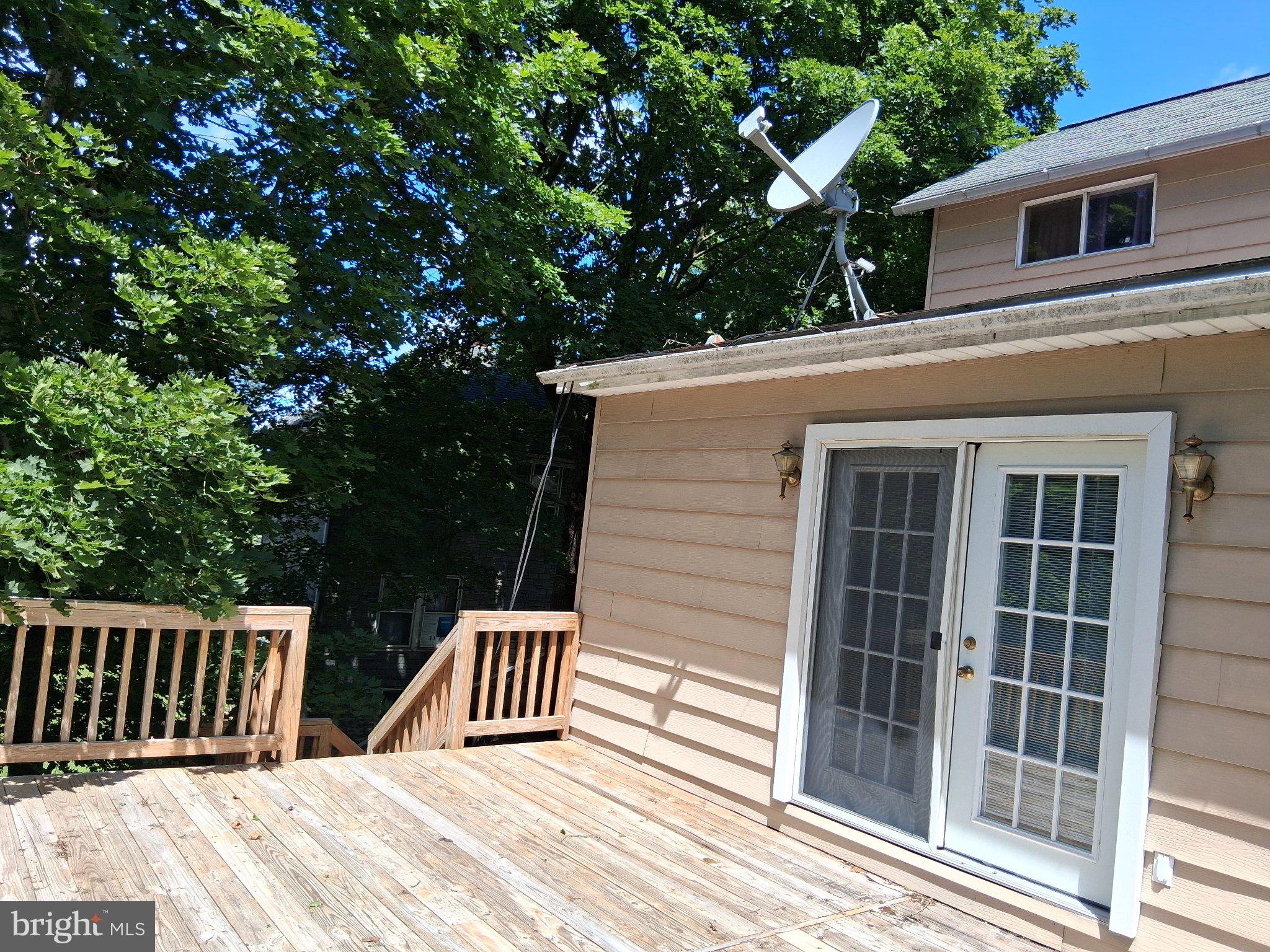 265 View Street Johnstown, PA 15902 - Photo 26 of 66 Charming deck with serene greenery.