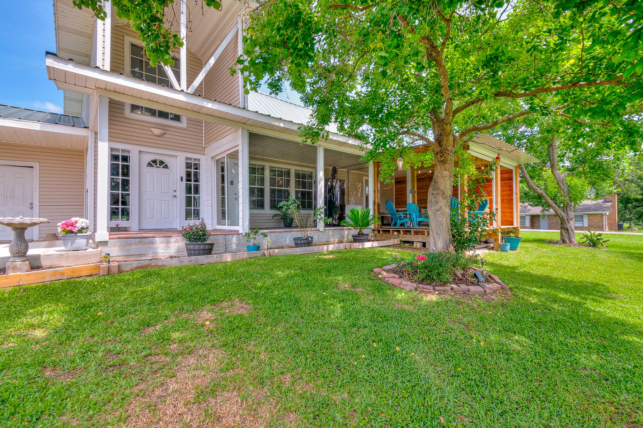 front view of a house with a yard