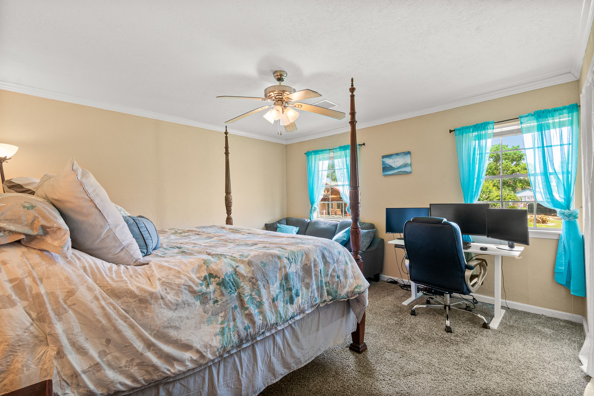 20 Clearview Point Blank, TX 77364 - Photo 15 of 38 a bedroom with a bed desk chair and a window
