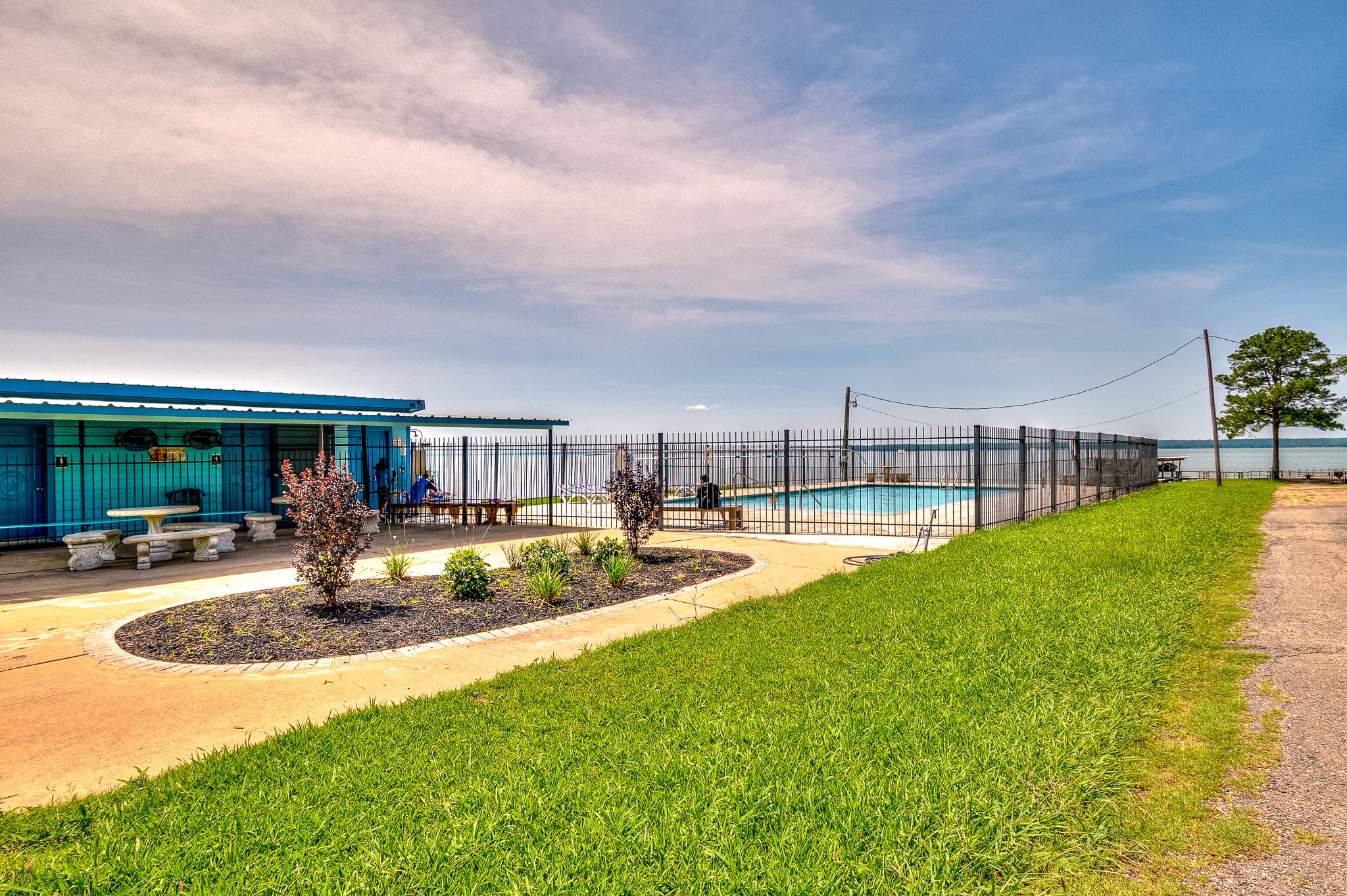 20 Clearview Point Blank, TX 77364 - Photo 33 of 38 a view of a house with swimming pool and sitting area