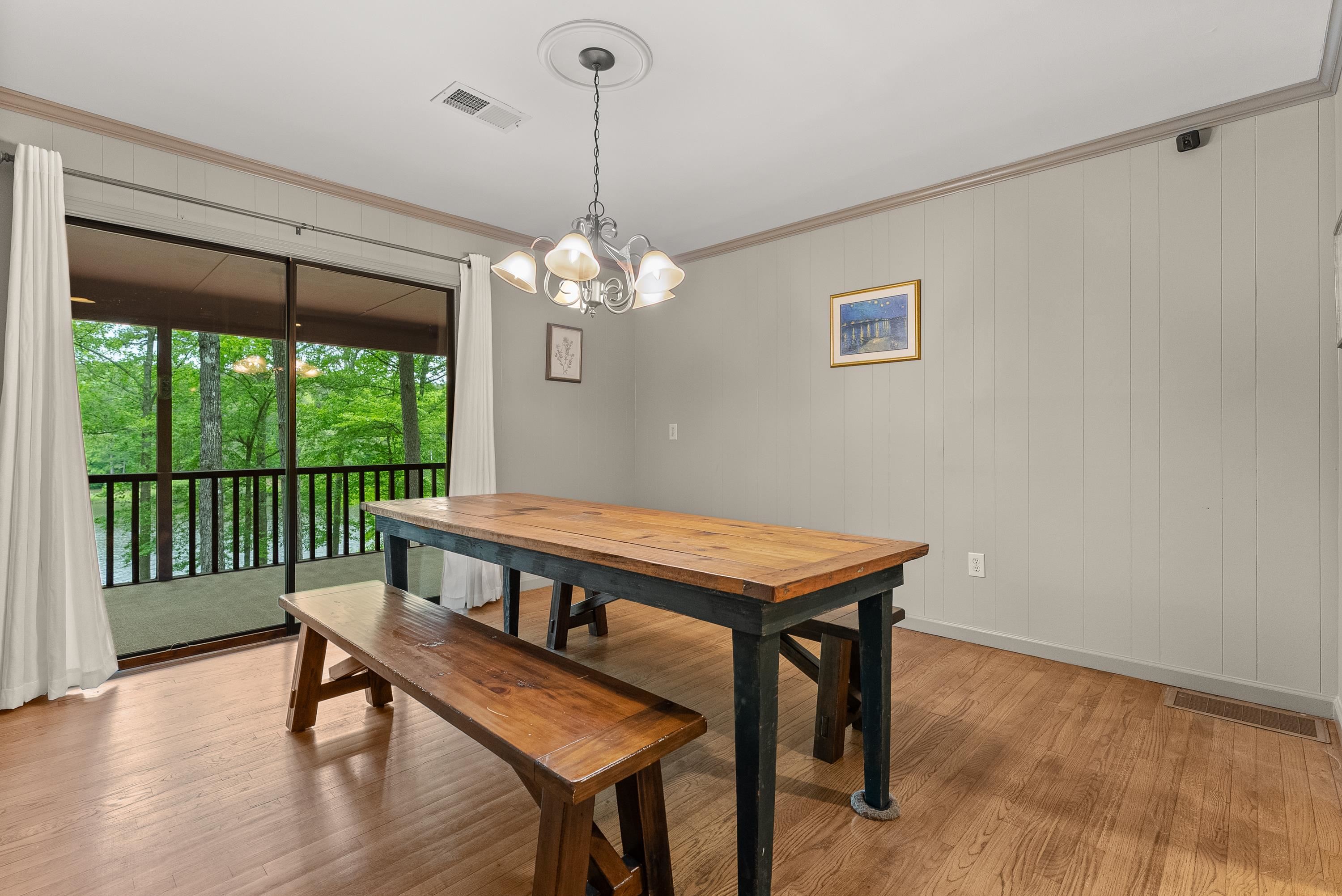 2275 Cypress Road Pocahontas, TN 38061 - Photo 21 of 34 Dining room with ornamental molding, a chandelier, and light wood-style floors