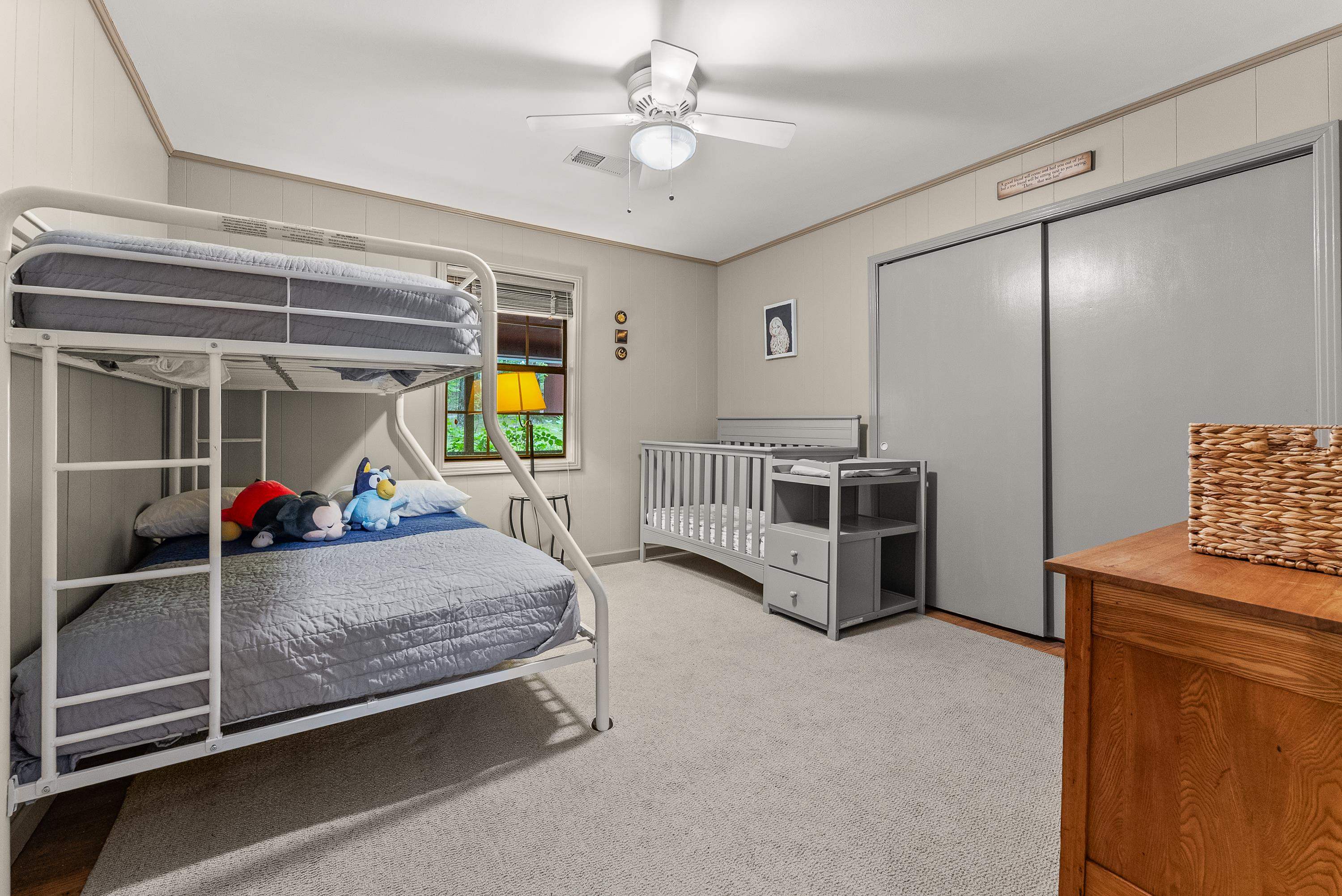 2275 Cypress Road Pocahontas, TN 38061 - Photo 24 of 34 Bedroom with a ceiling fan, carpet flooring, ornamental molding, and a closet