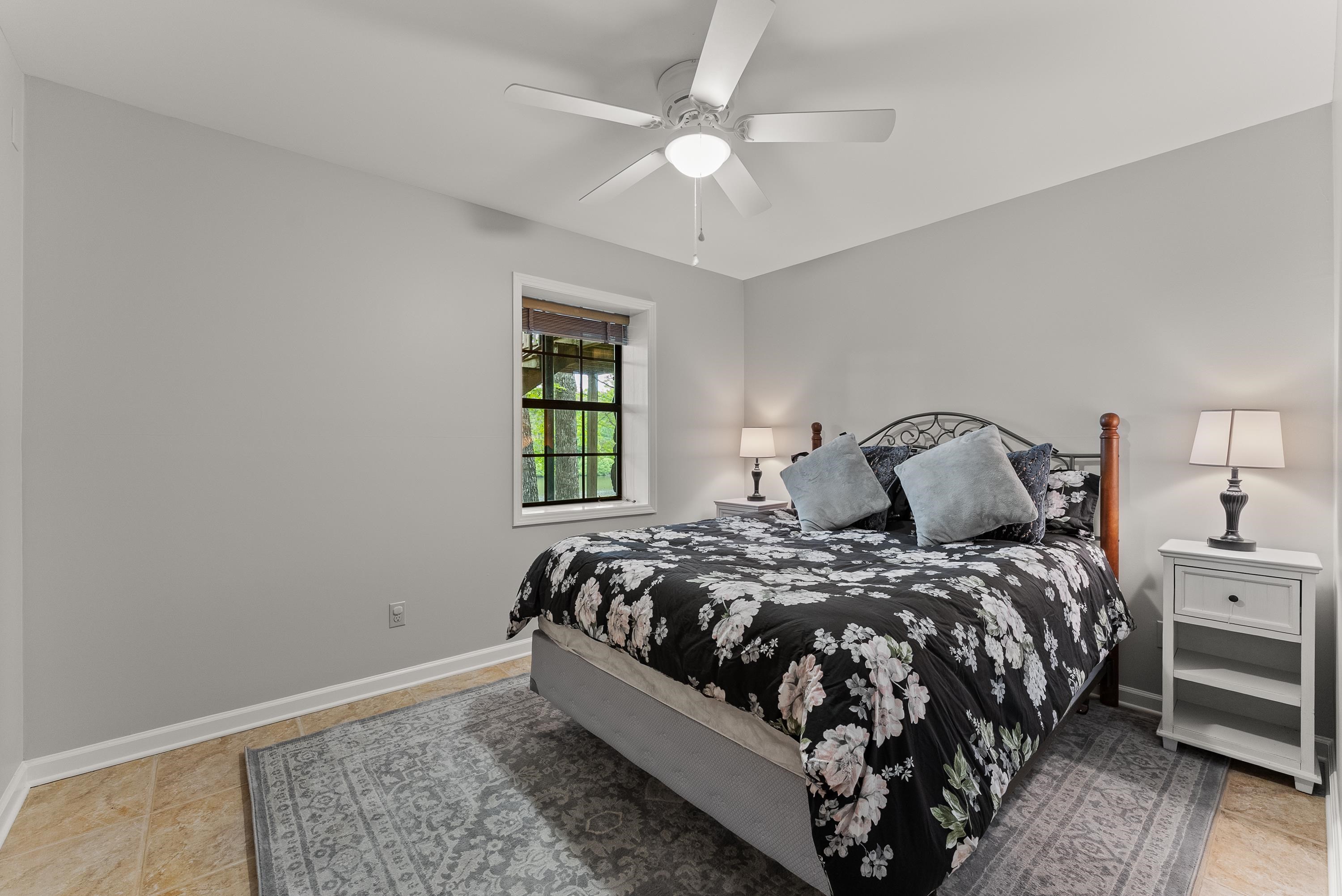 2275 Cypress Road Pocahontas, TN 38061 - Photo 27 of 34 Bedroom featuring baseboards and a ceiling fan