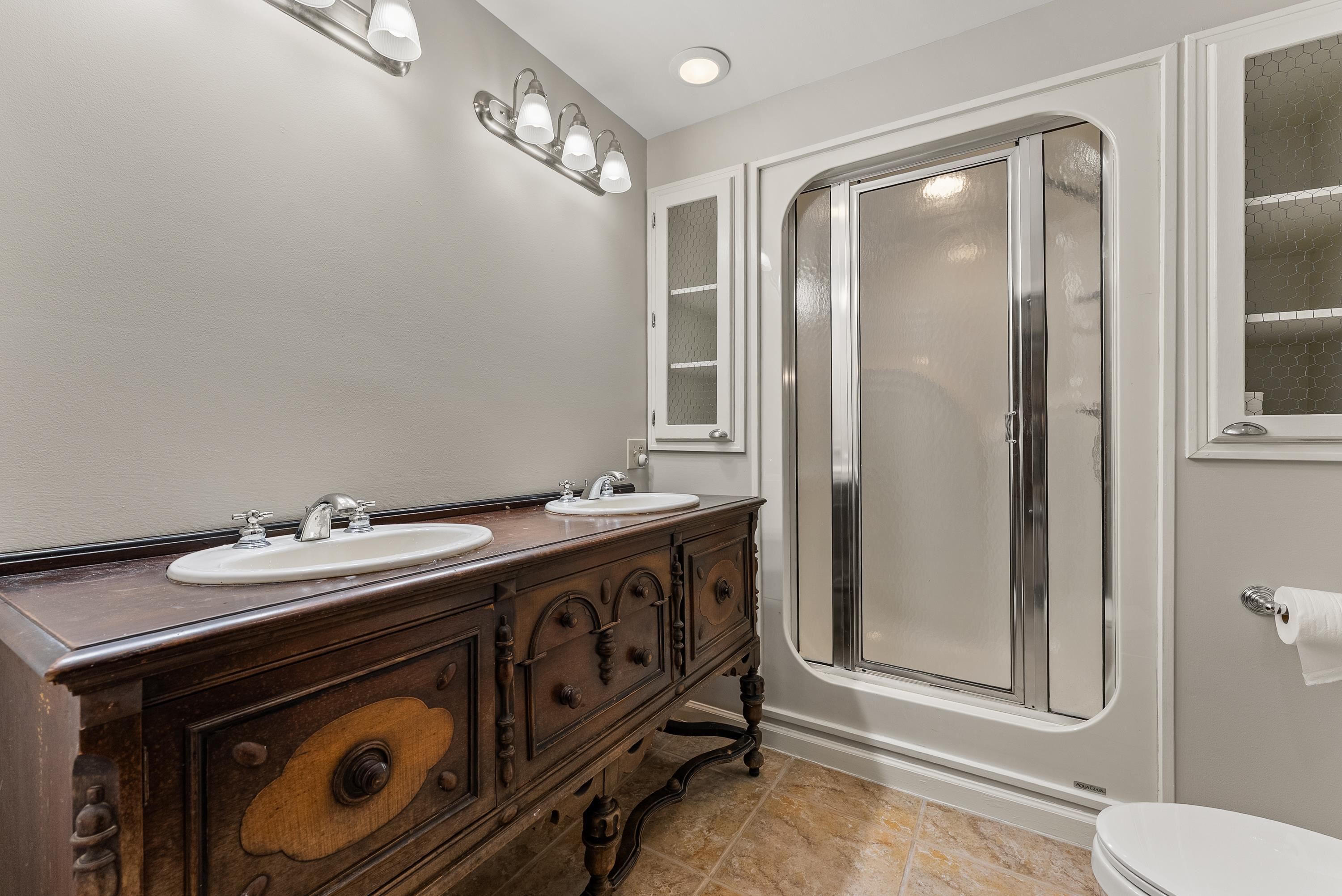 2275 Cypress Road Pocahontas, TN 38061 - Photo 28 of 34 Full bath featuring a shower with shower door, toilet, double vanity, and tile patterned floors