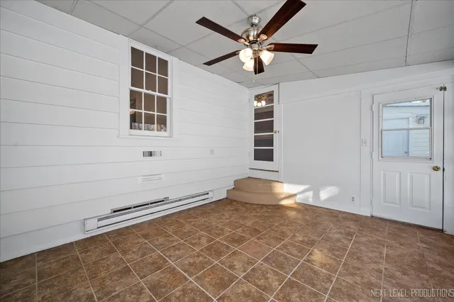 en empty room with windows