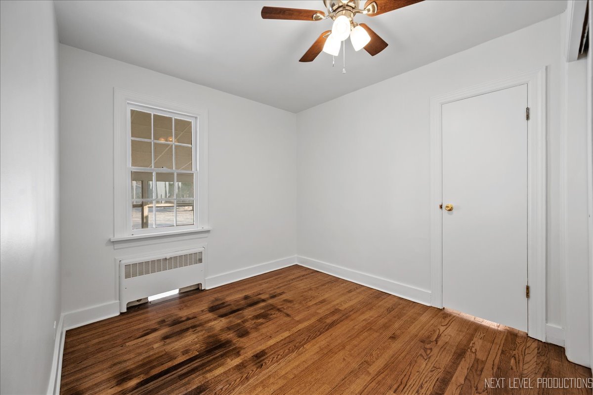 1326 South Elm Street St. Charles, IL 60174 - Photo 15 of 27 a view of empty room with wooden floor