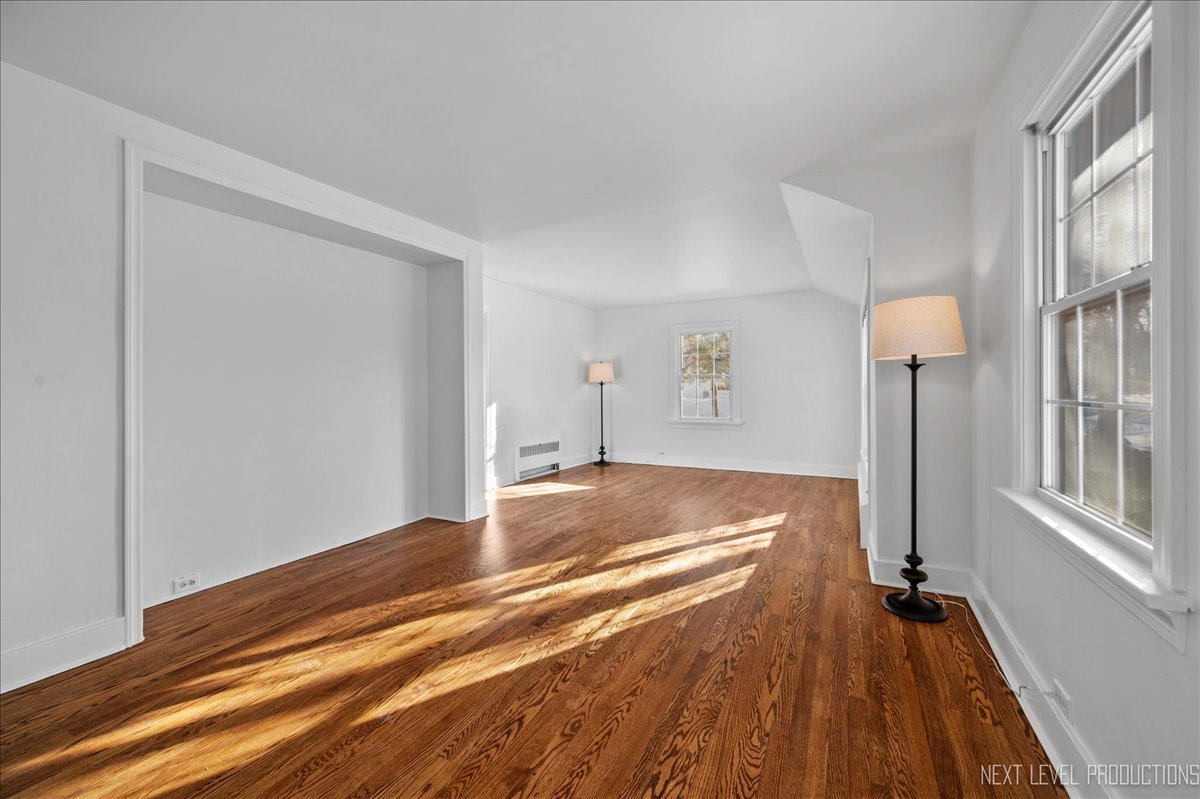 1326 South Elm Street St. Charles, IL 60174 - Photo 5 of 27 a view of bedroom with wooden floor