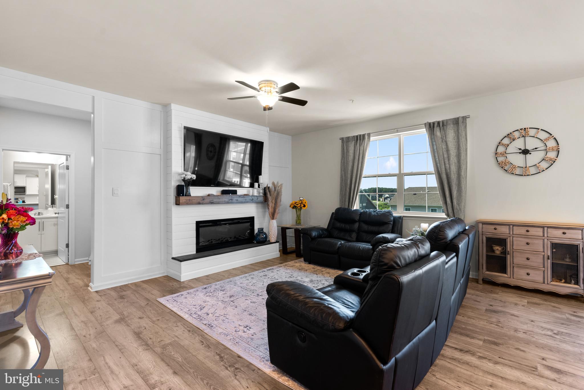 695 Stonegate Road Westminster, MD 21157 - Photo 3 of 44 Light & Bright Living Room w/ Cozy Fireplace
