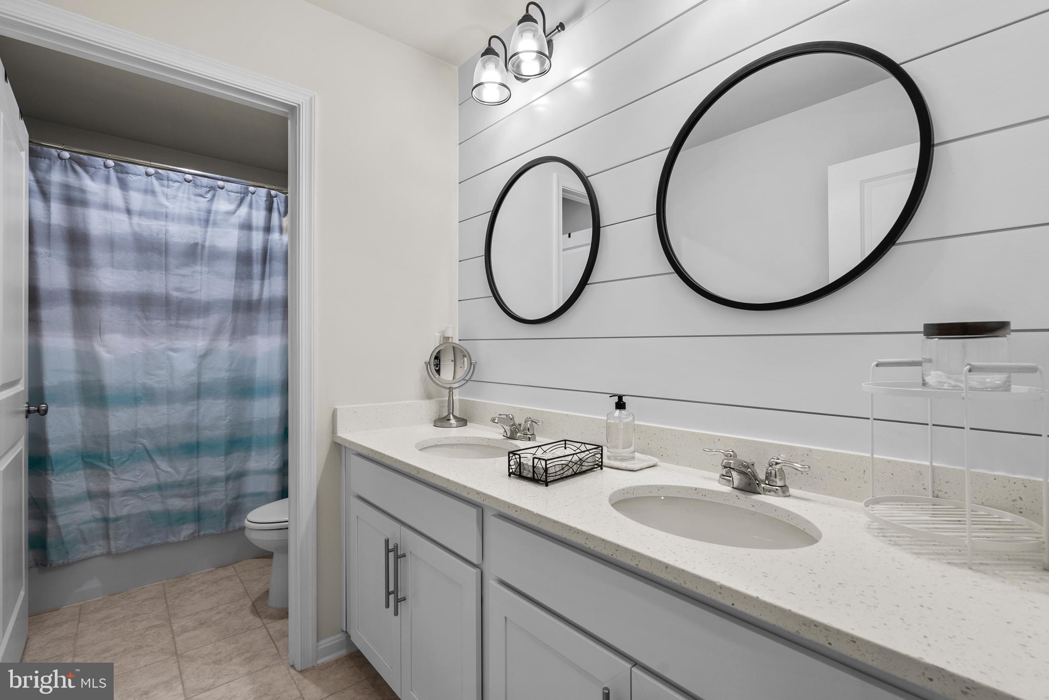 695 Stonegate Road Westminster, MD 21157 - Photo 31 of 44 Upper Level Shared Hall Bathroom Two