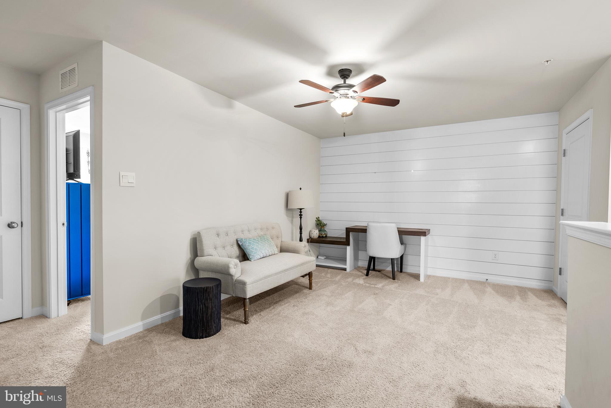 695 Stonegate Road Westminster, MD 21157 - Photo 32 of 44 Upper Level Den w/ Shiplap Accent Wall