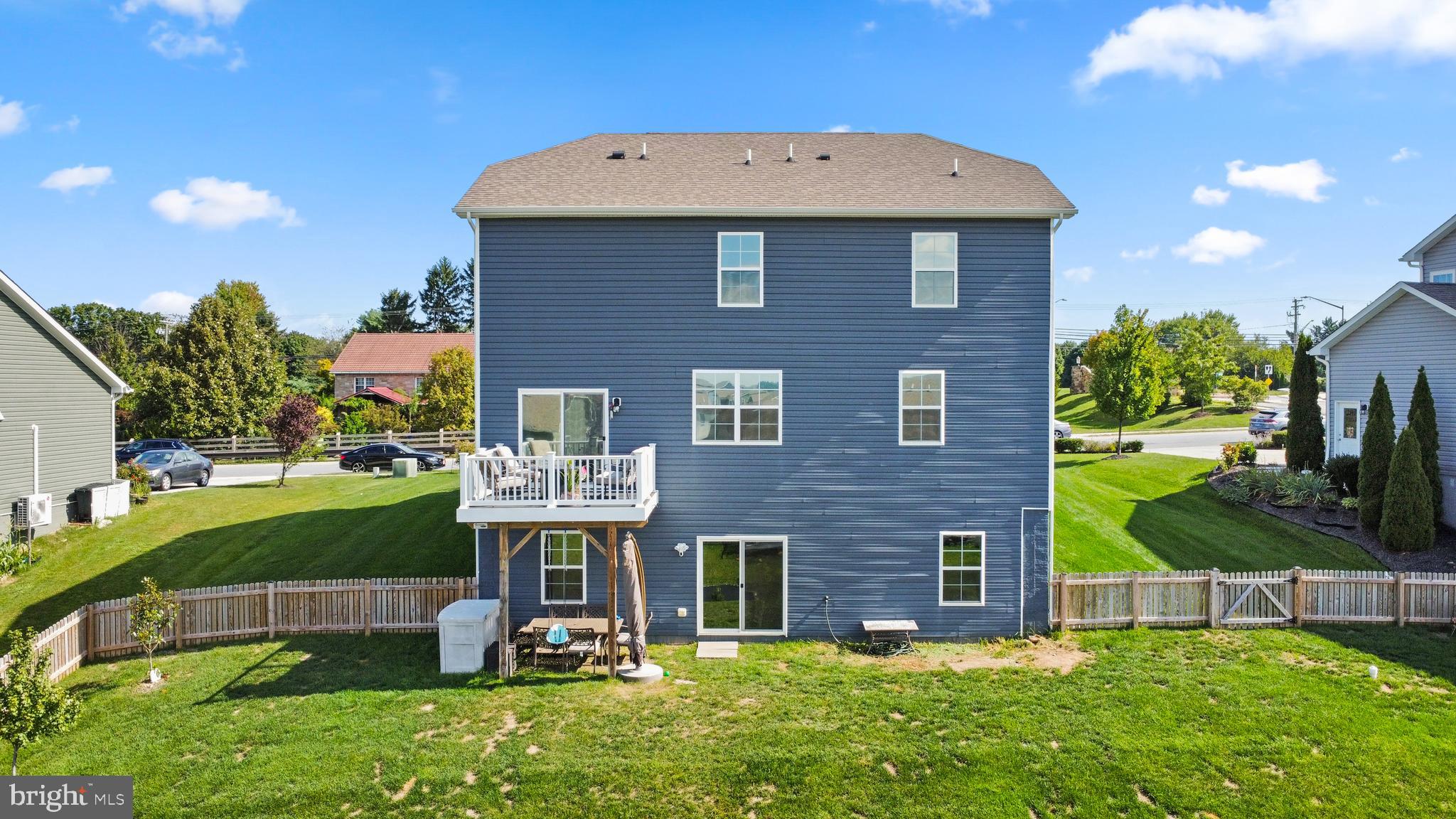 695 Stonegate Road Westminster, MD 21157 - Photo 38 of 44 Rear Exterior of Home with Deck