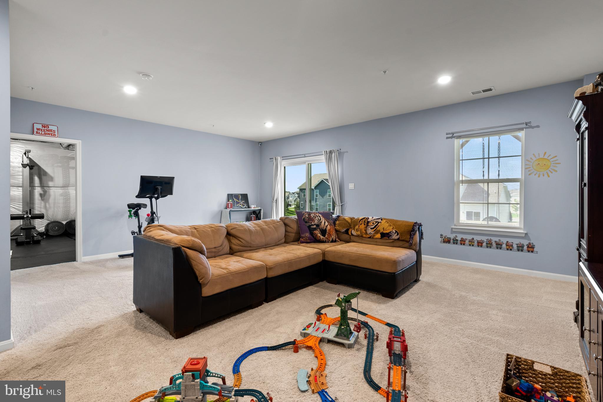 695 Stonegate Road Westminster, MD 21157 - Photo 6 of 44 Lower Level Rec. Room w/ Walk Out Slider