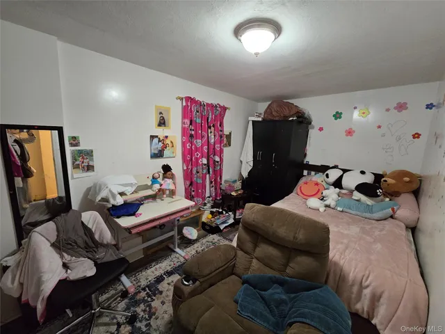 a bed room with a bed and furniture