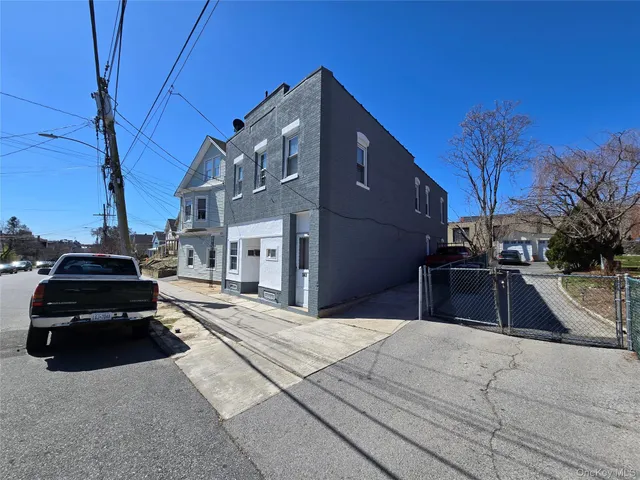 a car parked on the side of a street