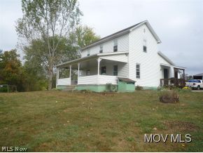 514 Cedar Ridge Road Lowell, OH 45744 - Photo 19 of 22 Side view of house