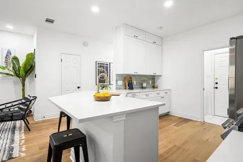 a view of kitchen and sink