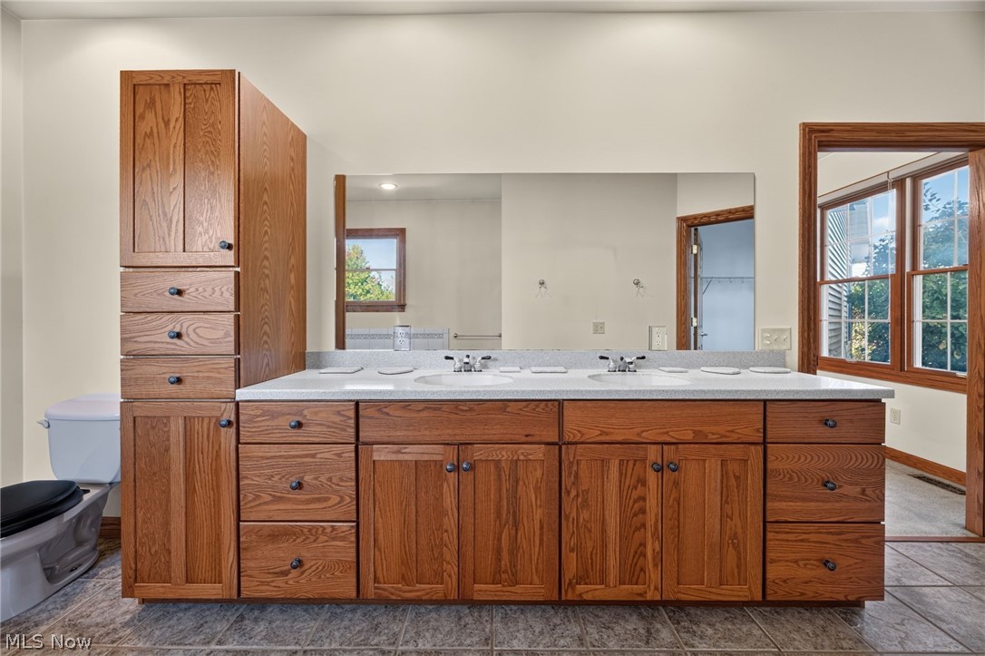 6615 Shilling Road Geneva, OH 44041 - Photo 29 of 49 Dual sink vanity w/ extra cabinets in primary bath
