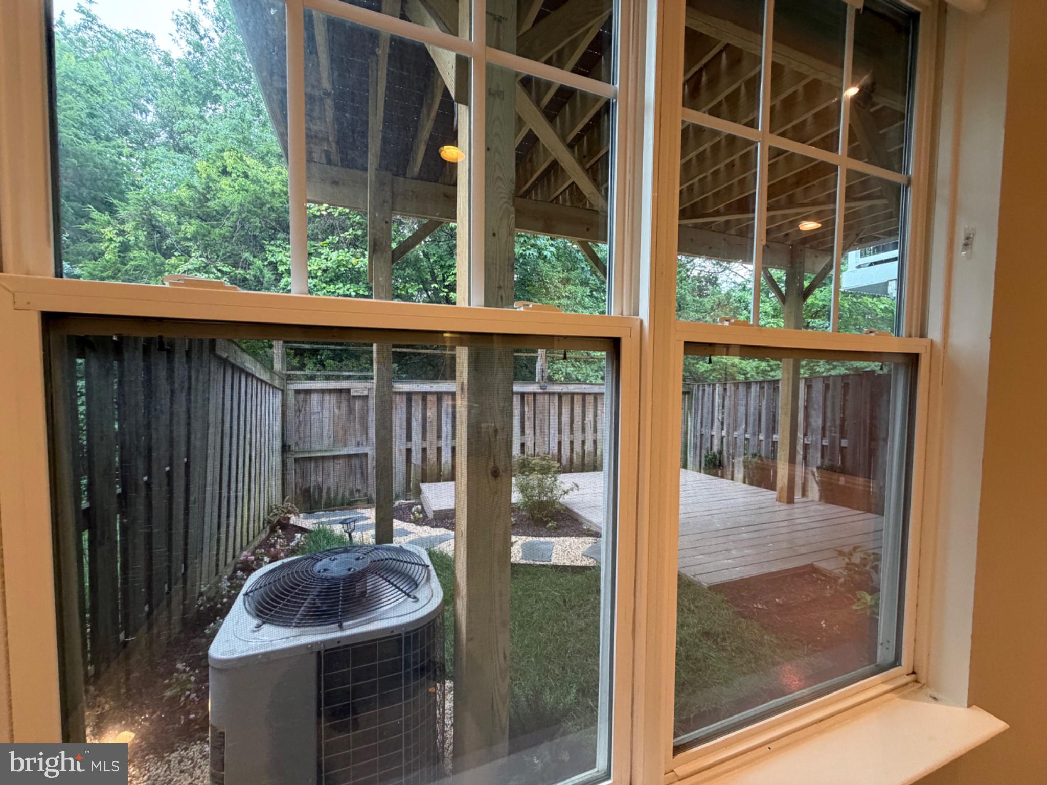 25333 Wakestone Terrace Chantilly, VA 20152 - Photo 43 of 109 Serene backyard view through window.