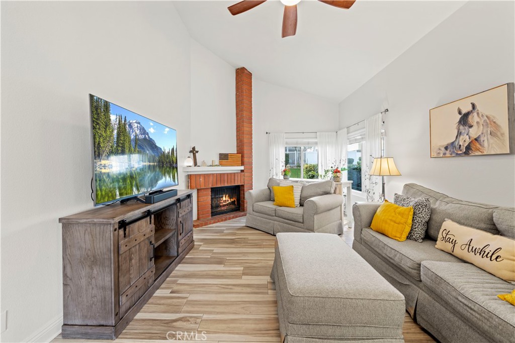 24243 Lema Drive Valencia, CA 91355 - Photo 12 of 37 a living room with furniture and a flat screen tv