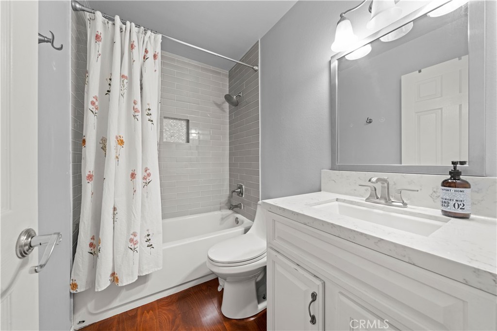 24243 Lema Drive Valencia, CA 91355 - Photo 20 of 37 a bathroom with a sink a toilet and shower