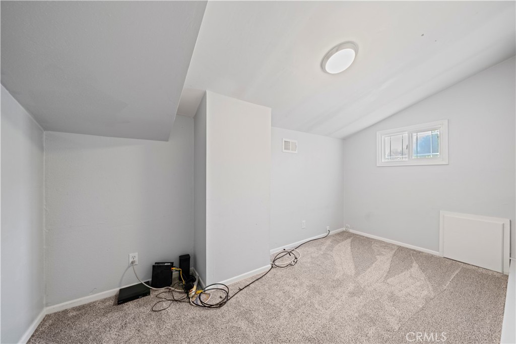 24243 Lema Drive Valencia, CA 91355 - Photo 27 of 37 a room with a empty space