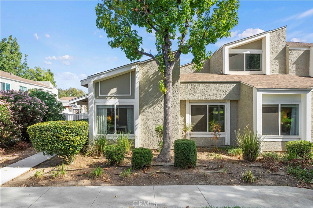 24243 Lema Drive Valencia, CA 91355 - Photo 28 of 37 front view of a house with a tree