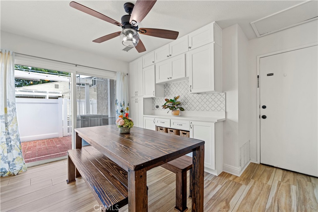 24243 Lema Drive Valencia, CA 91355 - Photo 8 of 37 a view of kitchen with furniture and wooden floor