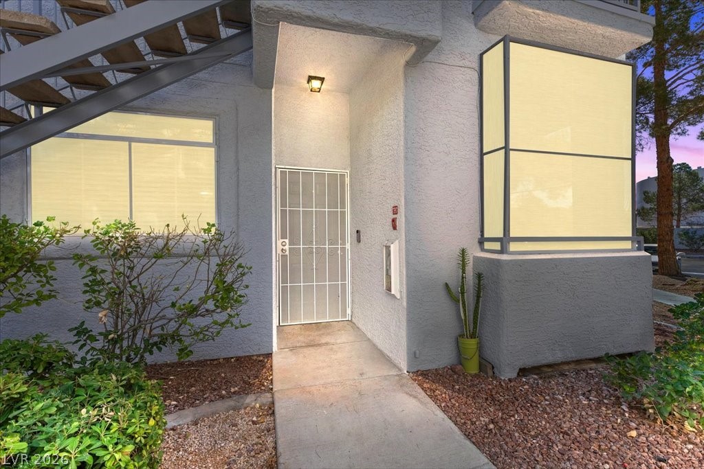 2201 Ramsgate Drive, Unit 818 Henderson, NV 89074 - Photo 23 of 31 Property entrance with stucco siding