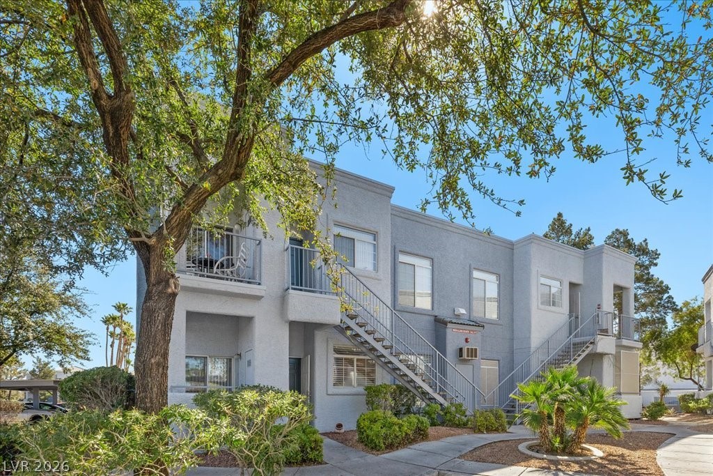 2201 Ramsgate Drive, Unit 818 Henderson, NV 89074 - Photo 24 of 31 View of apartment building / complex featuring stairs