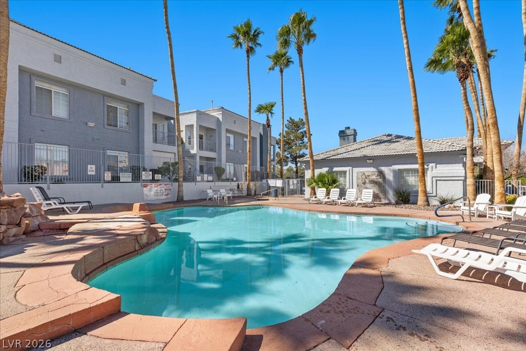 2201 Ramsgate Drive, Unit 818 Henderson, NV 89074 - Photo 26 of 31 Community pool with a patio area
