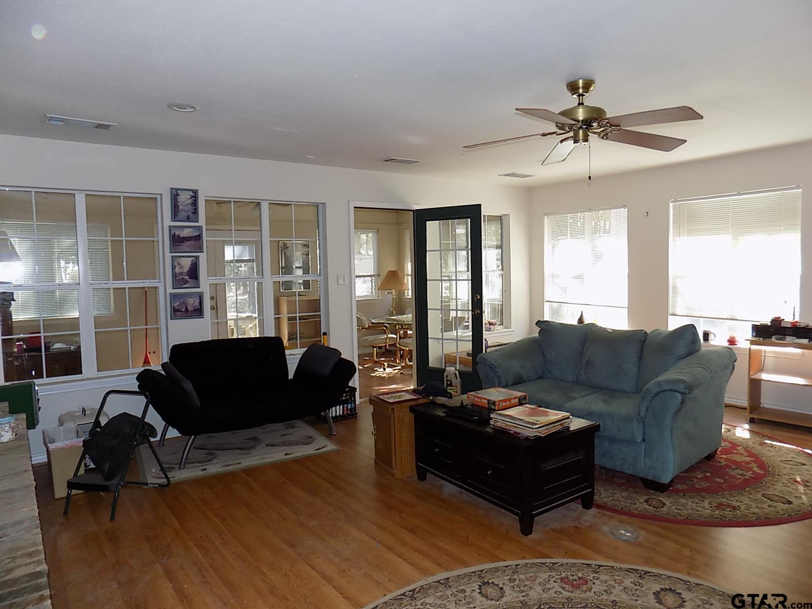 111 Laurel Lane Holly Lake Ranch, TX 75765 - Photo 14 of 43 a living room with furniture and a large window