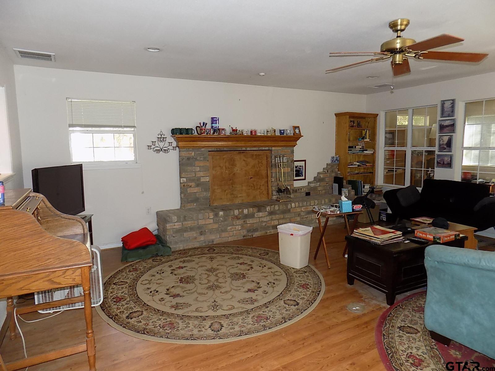 111 Laurel Lane Holly Lake Ranch, TX 75765 - Photo 15 of 43 a living room with furniture and a flat screen tv