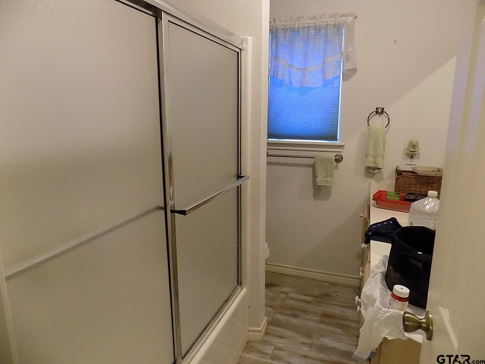 111 Laurel Lane Holly Lake Ranch, TX 75765 - Photo 32 of 43 a bathroom with a shower