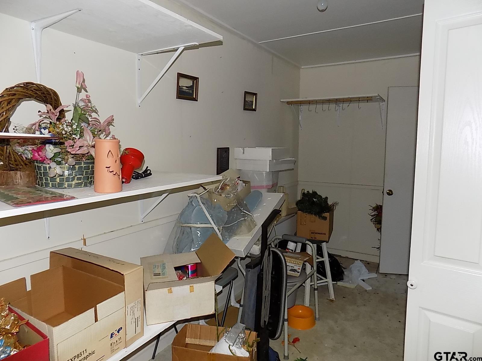 111 Laurel Lane Holly Lake Ranch, TX 75765 - Photo 39 of 43 a utility room with dryer and washer